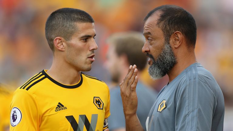 Nuno Espirito Santo, (R) the Wolverhampton Wanderers manager talks to his captain Conor Coady during the pre-season friendly match between Stoke City and Wolverhampton Wanderers at the Bet365 Stadium on July 25, 2018 in Stoke on Trent, England.