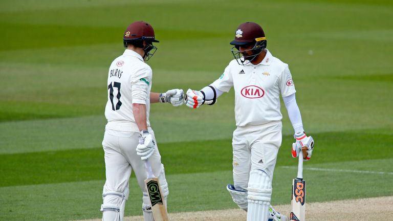 Kumar Sangakkara (right) was a big influence on Burns during their time together at Surrey