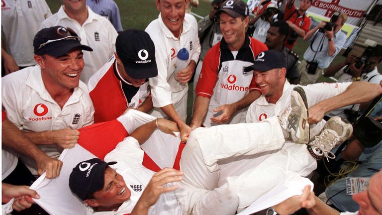 Darren Gough is held up in an England flag by his team-mates after England's Test series win over Sri Lanka in 2001