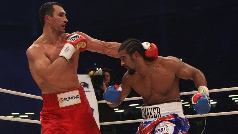 HAMBURG, GERMANY - JULY 02: David Haye of England (L) exchanges punches with Wladimir Klitschko (R) of Ukraine during the WBC Heavyweight World Championship fight between Wladimir Klitschko of Ukraine and David Haye of England at Imtech Arena on July 2, 2011 in Hamburg, Germany. (Photo by Martin Rose/Bongarts/Getty Images) 