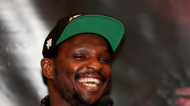 Dillian Whyte smiles during a press conference at the Canary Riverside Plaza Hotel on November 01, 2018