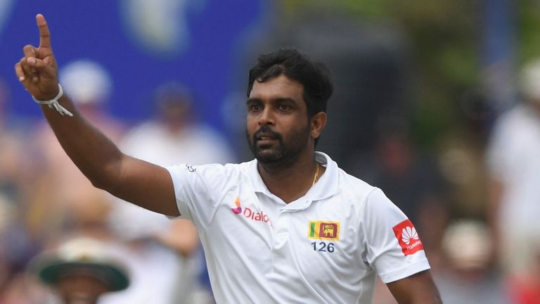 Sri Lanka's Dilruwan Perera celebrates dismissing England's Moeen Ali for three