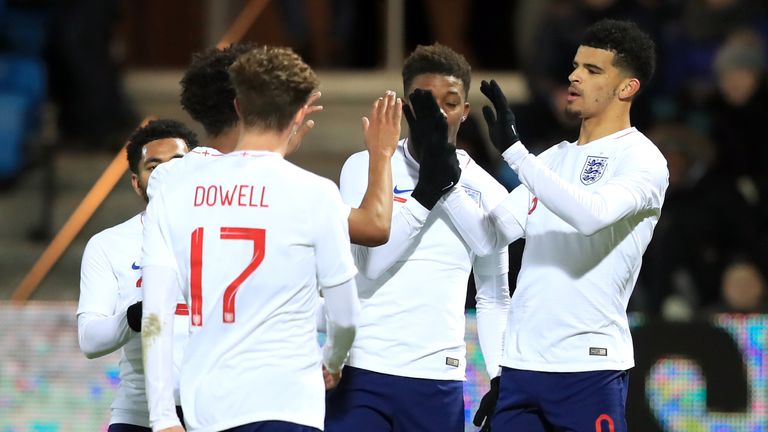 England U21's Dominic Solanke (right) celebrates scoring his side's second goal of the game 