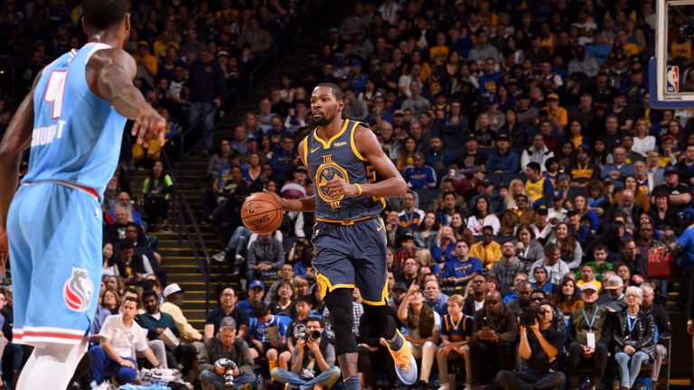 OAKLAND, CA - NOVEMBER 24: Kevin Durant #35 of the Golden State Warriors handles the ball against the Sacramento Kings on November 24, 2018 at ORACLE Arena in Oakland, California. NOTE TO USER: User expressly acknowledges and agrees that, by downloading and/or using this photograph, user is consenting to the terms and conditions of Getty Images License Agreement. Mandatory Copyright Notice: Copyright 2018 NBAE (Photo by Noah Graham/NBAE via Getty Images)