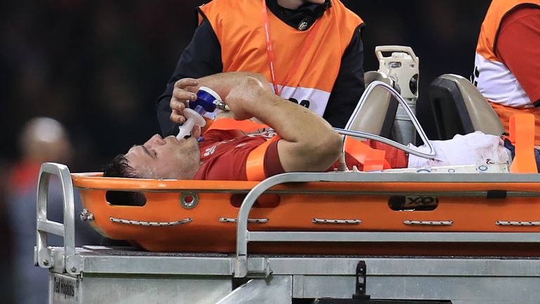 Wales' Ellis Jenkins is stretchered off injured 