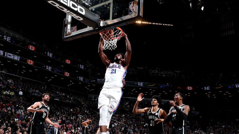 Joel Embiid dunks on the Brooklyn Nets