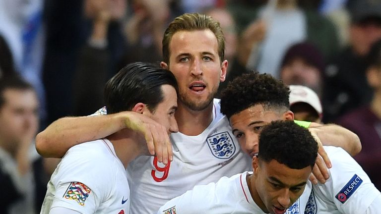 Harry Kane celebrates with England players after scoring the winner against Croatia