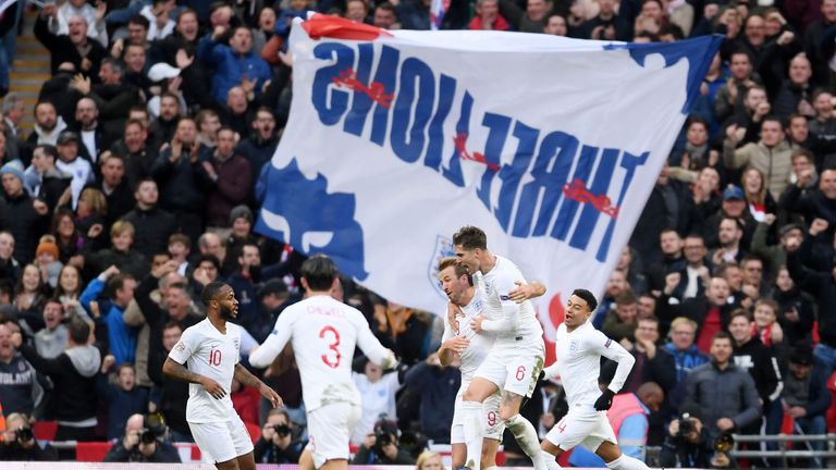 England players celebrate after they draw level with Croatia at Wembley