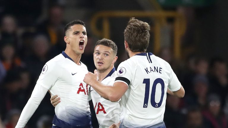 Erik Lamela celebrates with Kieran Trippier and Harry Kane following his goal against Wolves