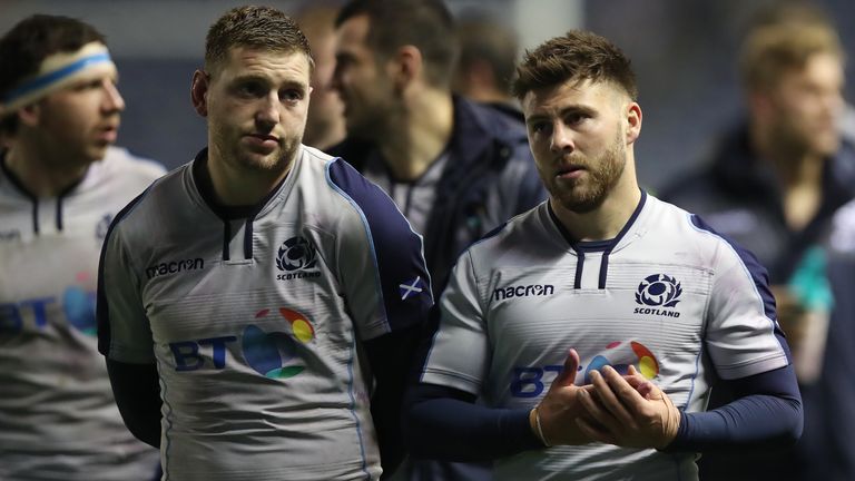 Finn Russell and Ali Price show their disappointment after the defeat