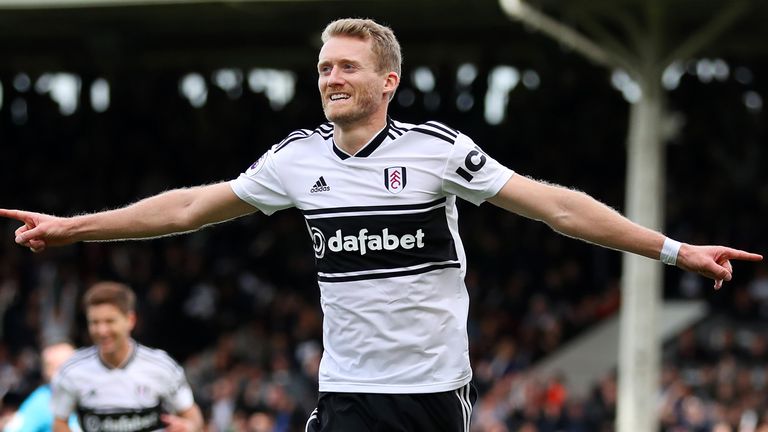 Andre Schurrle of Fulham celebrates after scoring his team&#39;s first goal during the Premier League match between Fulham FC and Arsenal FC at Craven Cottage on October 7, 2018 in London, United Kingdom. 