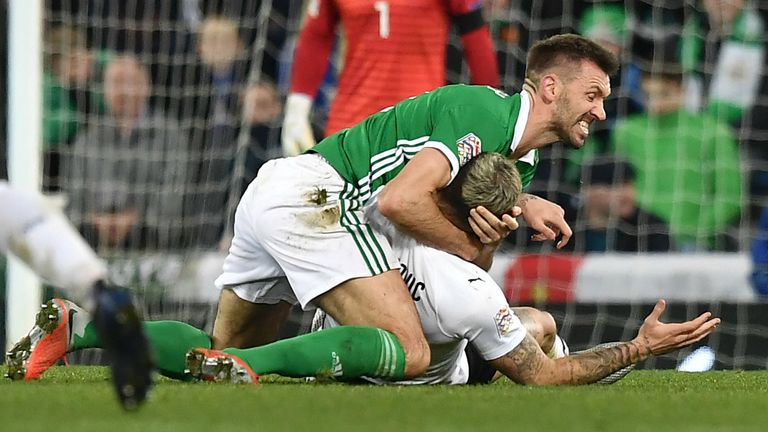 Gareth McAuley and Marko Arnautovic clash during the Nations League match between Northern Ireland and Austria