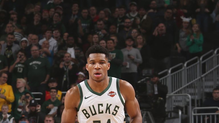 Giannis Antetokounmpo #34 of the Milwaukee Bucks handles the ball against the Portland Trail Blazers on November 21, 2018 at Fiserv Forum in Milwaukee, Wisconsin.