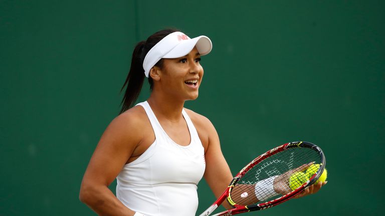 Heather Watson of Great Britain prepares to serve during their Mixed Doubles second round match against Marcin Matkowski of Poland and Mihaela Buzarnescu of Romania on day seven of the Wimbledon Lawn Tennis Championships at All England Lawn Tennis and Croquet Club on July 9, 2018 in London, England.