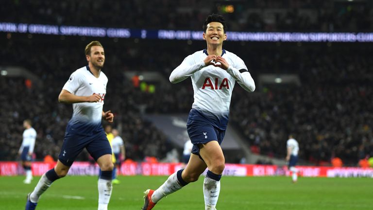 Heung-Min Son celebrates after scoring Tottenham's third goal