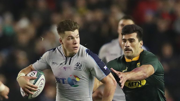 EDINBURGH, SCOTLAND - NOVEMBER 17: Huw Jones of Scotland evades Damian de Allende of South Africa during the International Friendly match between Scotland  and South Africa at Murrayfield Stadium on November 17, 2018 in Edinburgh, United Kingdom. (Photo by Ian MacNicol/Getty Images)