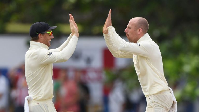 Spinner Jack Leach (right) celebrates taking the wicket of Kaushal Silva