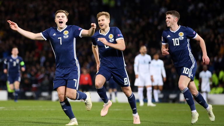 Scotland's James Forrest (left) celebrates scoring his side's second goal of the game with Stuart Armstrong (centre) and Ryan Christie during the UEFA Nations League, Group C1 match at Hampden Park, Glasgow. PRESS ASSOCIATION Photo. Picture date: Tuesday November 20, 2018. See PA story SOCCER Scotland. Photo credit should read: Jane Barlow/PA Wire. RESTRICTIONS: Use subject to restrictions. Editorial use only. Commercial use only with prior written consent of the Scottish FA.