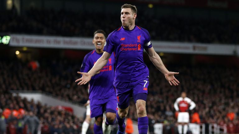 James Milner celebrates putting Liverpool ahead