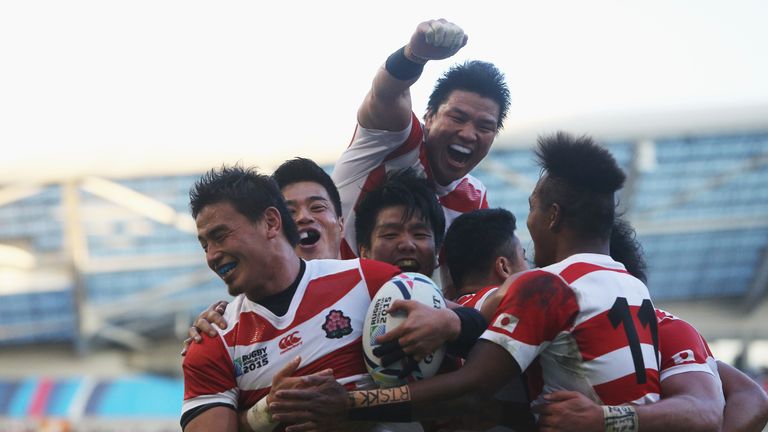 Japan's Ayumu Goromaru is congratulated on scoring against South Africa during their clash at the 2015 Rugby World Cup.