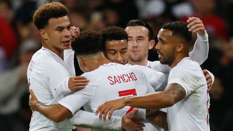 England's midfielder Jesse Lingard (C) celebrates scoring their first goal during the international friendly football match between England and the United States at Wembley stadium in north London on November 15, 2018.