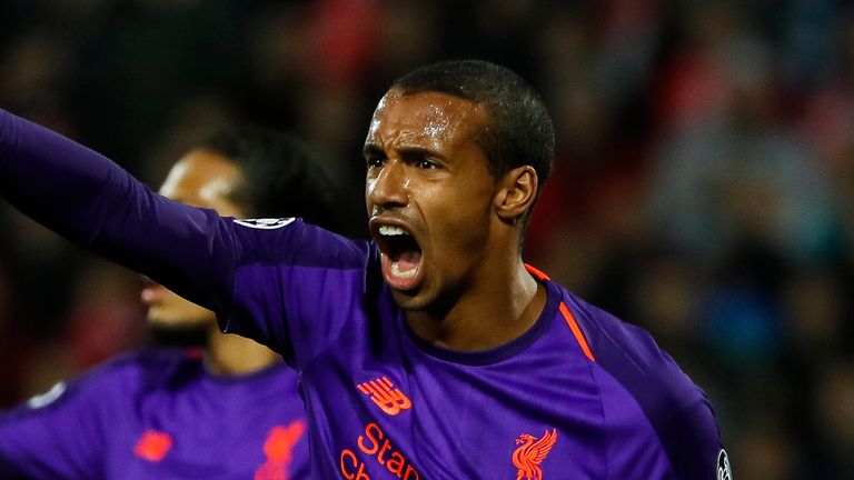 Joel Matip (R) of Liverpool reacts during the Group C match of the UEFA Champions League between Red Star Belgrade and Liverpool at Rajko Mitic Stadium on November 06, 2018 in Belgrade, Serbia. 