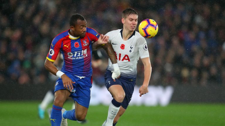 Jordan Ayew of Crystal Palace battles for possession with Juan Foyth of Tottenham Hotspur during the Premier League match between Crystal Palace and Tottenham Hotspur at Selhurst Park on November 10, 2018 in London, United Kingdom
