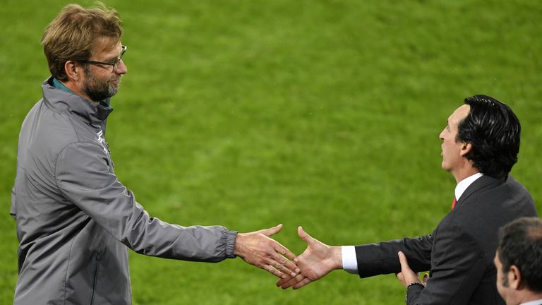 Sevilla&#39;s Spanish head coach Unai Emery (R) shakes hands with Liverpool&#39;s German head coach Jurgen Klopp after Sevilla won the UEFA Europa League final football match between Liverpool FC and Sevilla FC at the St Jakob-Park stadium in Basel, on May 18, 2016. AFP PHOTO / FABRICE COFFRINI / AFP / FABRICE COFFRINI (Photo credit should read FABRICE COFFRINI/AFP/Getty Images)