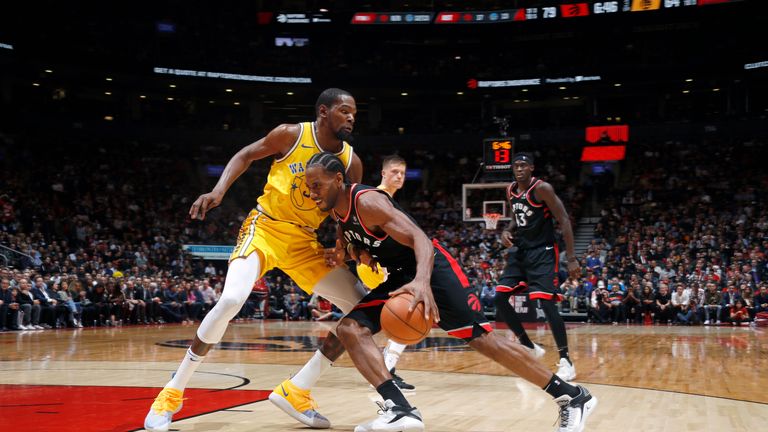 Kevin Durant defends Kawhi Leonard at Scotiabank Arena in Toronto during the regular season