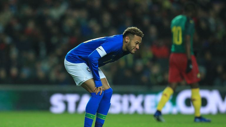 Brazil's Neymar leaves the field injured against Cameroon at Stadium:MK