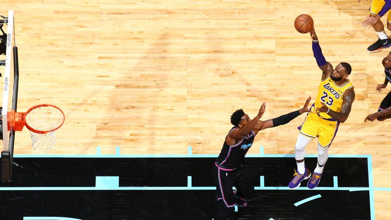  LeBron James #23 of the Los Angeles Lakers shoots the ball against the Miami Heat on November 18, 2018 at American Airlines Arena in Miami, Florida.