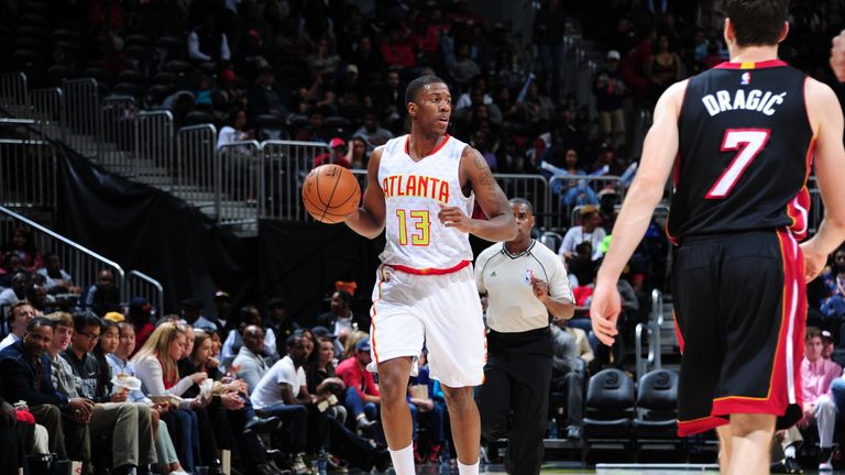 Lamar Patterson #13 of the Atlanta Hawks handles the ball during the game against the Portland Trail Blazers on December 21, 2015 at Philips Arena in Atlanta, Georgia. 