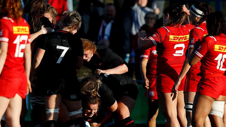  Lark Davies goes over for a try against Canada