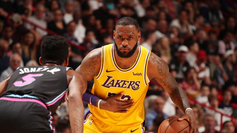LeBron James #23 of the Los Angeles Lakers handles the ball against the Miami Heat on November 18, 2018 at American Airlines Arena in Miami, Florida.