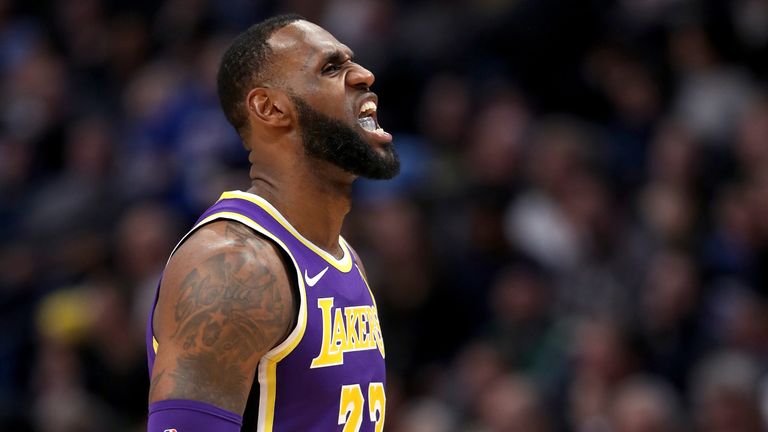 Lebron James #23 of the Los Angeles Lakers walks to the bench while playing the Denver Nuggets in the fourth quarter at the Pepsi Center on November 27, 2018 in Denver, Colorado.
