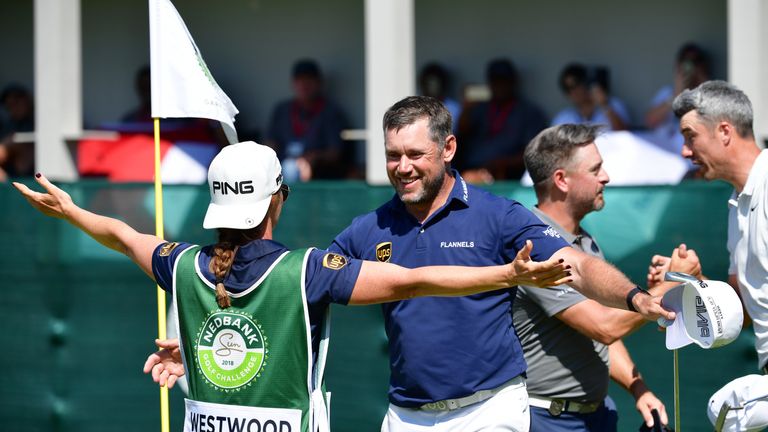 Lee Westwood of England celebrates with partner Helen Storey are he wins the final round during Day Four of the Nedbank Golf Challenge at Gary Player CC on November 11, 2018 in Sun City, South Africa