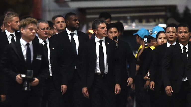 Leicester City manager Claude Puel (centre) and players arrive at Wat Thepsirin temple in Bangkok