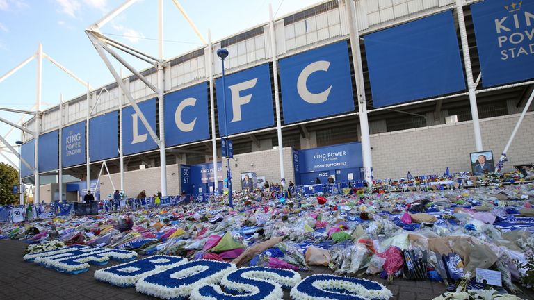 Wreaths spelling out "The Boss" are left by Leicester City players for Vichai Srivaddhanaprabha outside the King Power Stadium