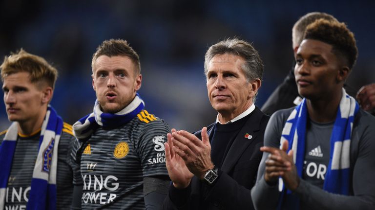 Claude Puel and his Leicester players applaud their supporters after the win