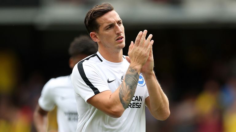 Lewis Dunk of Brighton and Hove Albion applauds fans prior to the Premier League match between Watford FC and Brighton & Hove Albion at Vicarage Road on August 11, 2018 in Watford, United Kingdom. 
