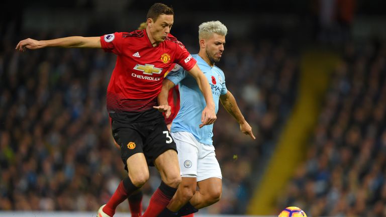 Sergio Aguero of Manchester City is challenged by Nemanja Matic of Manchester United during the Premier League match between Manchester City and Manchester United at Etihad Stadium on November 11, 2018 in Manchester, United Kingdom.