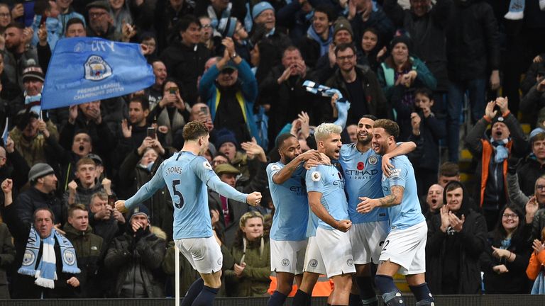 Sergio Aguero celebrates with his Manchester City team-mates after his goal