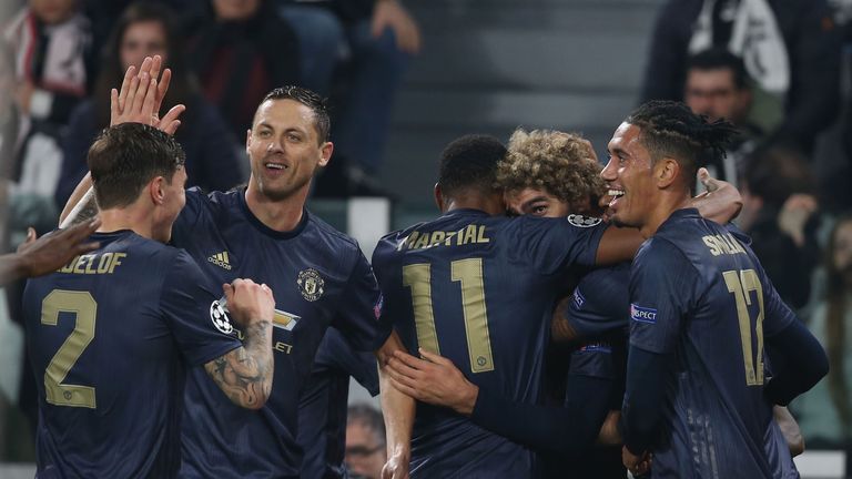 Man Utd celebrate after their late winner against Juventus 