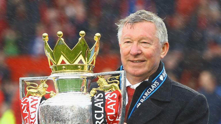 Manchester United&#39;s Sir Alex Ferguson with the Premier League trophy at Old Trafford on May 12, 2013 in Manchester, England.