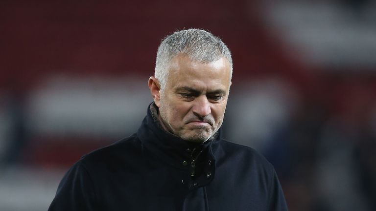 Mourinho walks off the pitch after Saturday's goalless draw against Crystal Palace