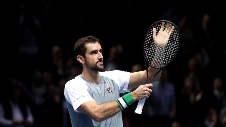 Marin Cilic of Croatia celebrates match point during his singles round robin match against John Isner of The United States during Day Four of the Nitto ATP Finals at The O2 Arena on November 14, 2018 in London, England