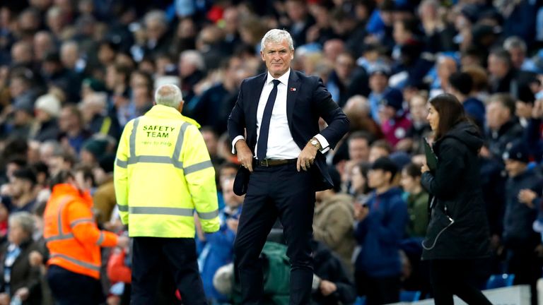 Mark Hughes watches on from the sidelines