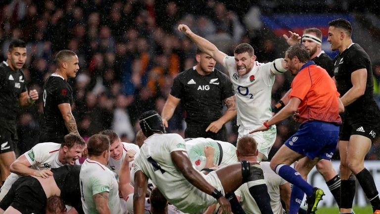 Mark Wilson of England celebrates as team mate Dylan Hartley touches down for the second try during the Quilter International match between England and New Zealand at Twickenham Stadium on November 10, 2018 in London, United Kingdom.