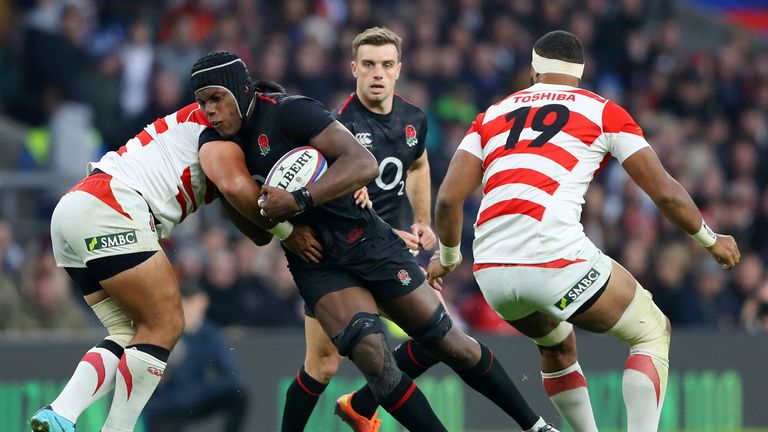 Maro Itoje carries the ball into Japan's defence