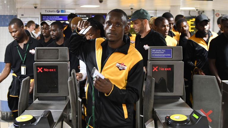 Members of the Matabeleland team take part in a sightseeing tour of London on the sidelines of the alternative World Football Cup on June 8, 2018. - Matabeleland have gone on a dramatic journey from having two balls and a dirt field to becoming the all-singing, all-dancing heroes of the alternative World Football Cup